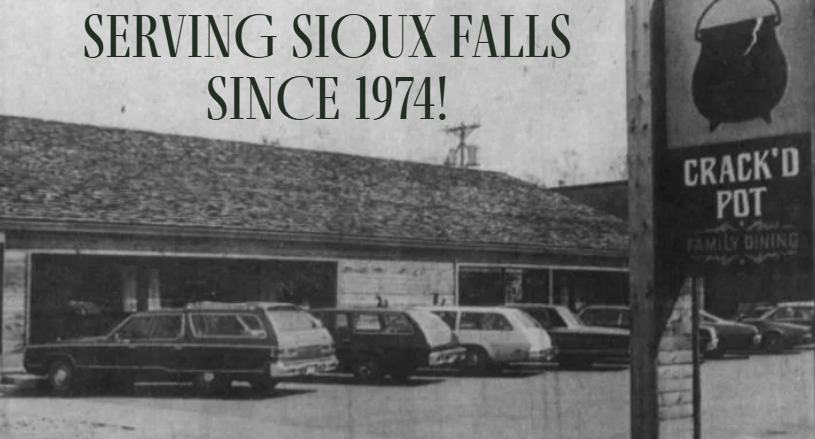 Old photo of The Crack'd Pot building with a sign reading Serving Sioux Falls since 1974