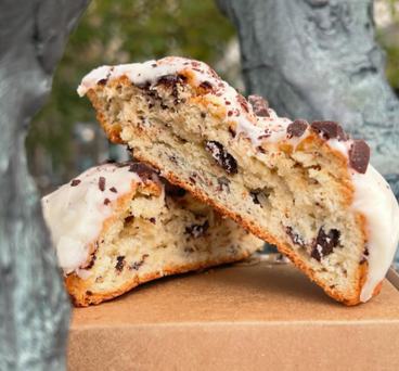 A pastry cut open to show chocolate chips and icing at North End Bakery & Deli