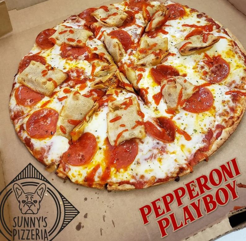 A Pepperoni Playboy pizza on a Sunny's Pizzeria box